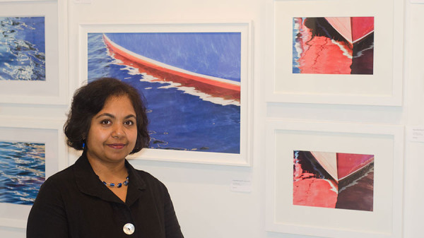 Artist and fine art photographer Elizabeth Hesp in front of her fine art frames at her Spring 2014 exhibition.