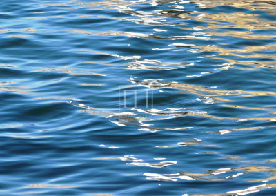 Indigo water reflection as abstract photographic image