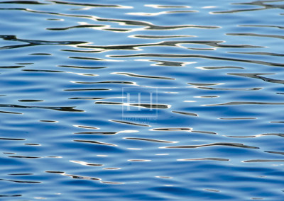 Lucid reflection on water in shades of blue